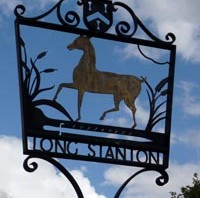 longstanton sign with a horse in it